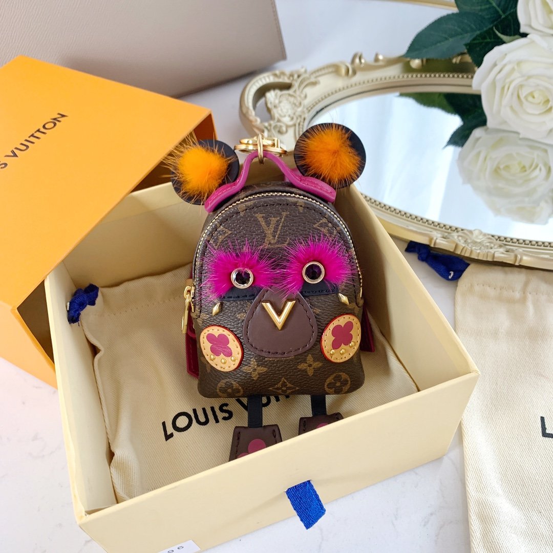 LU NEW WAVE Bag Decoration and Keychain M63749 This New Wave Bag Decoration and Keychain demonstrates a reinterpretation of the brand's eye-catching LV logo. New Wave story's iconic pattern design, eye-catching colors and classic Mon6 - Image 2