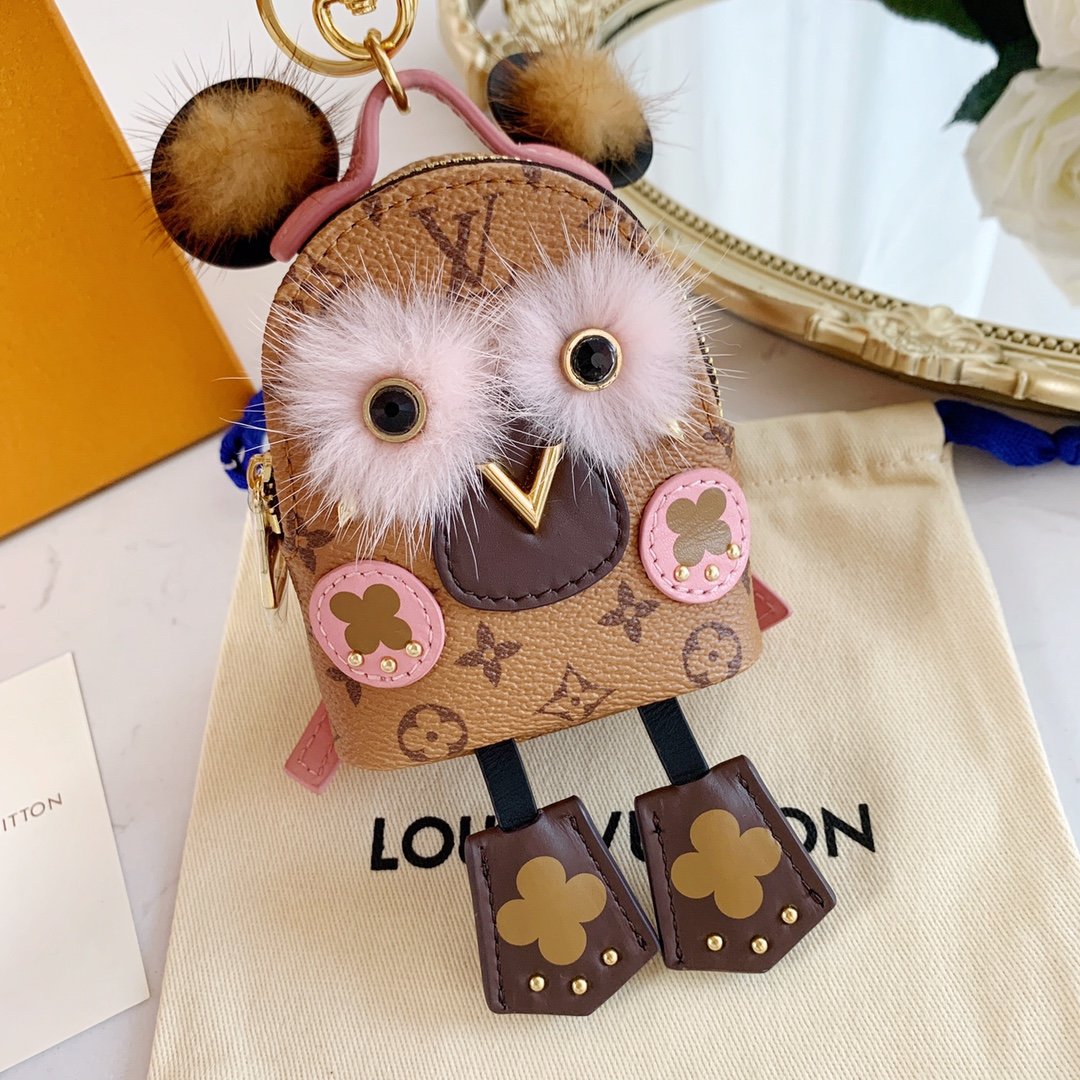 LU NEW WAVE Bag Decoration and Keychain M63749 This New Wave Bag Decoration and Keychain demonstrates a reinterpretation of the brand's eye-catching LV logo. New Wave story's iconic pattern design, eye-catching colors and classic Mon6 - Image 8