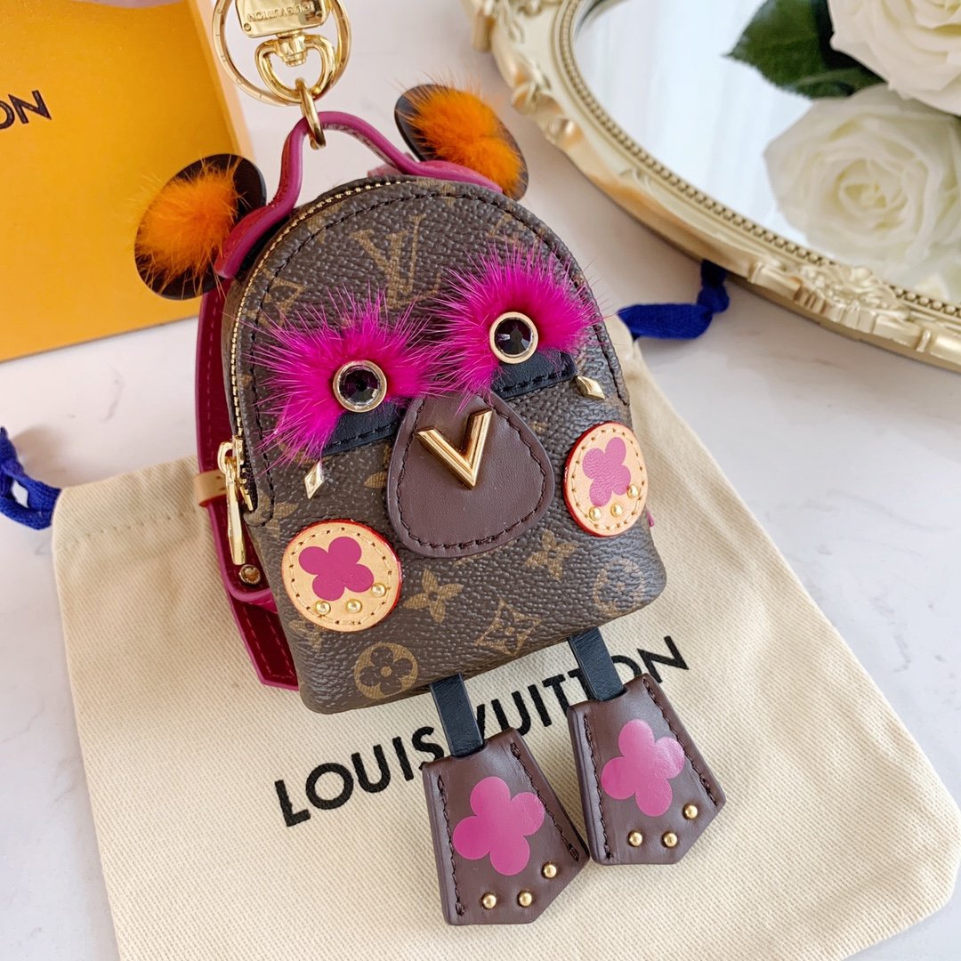 LU NEW WAVE Bag Decoration and Keychain M63749 This New Wave Bag Decoration and Keychain demonstrates a reinterpretation of the brand's eye-catching LV logo. New Wave story's iconic pattern design, eye-catching colors and classic Mon6 - Image 8