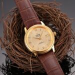 Omega De Ville Prestige Automatic Champagne Dial Yellow Gold Men's Watch