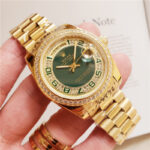 Rolex Day-Date 36 M118348-83208 118348-83208 18ct Yellow Gold Green Diamonds Diamond Bezel