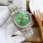 Rolex Day-Date 40mm President 18kt YG White Dial 228238 Bevelled Deconstructed (blue face silver white strap)