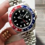 Unworn Rolex GMT-Master II, 40mm, Batman, Jubilee, 126710BLNR, dated 2025 black face red blue border
